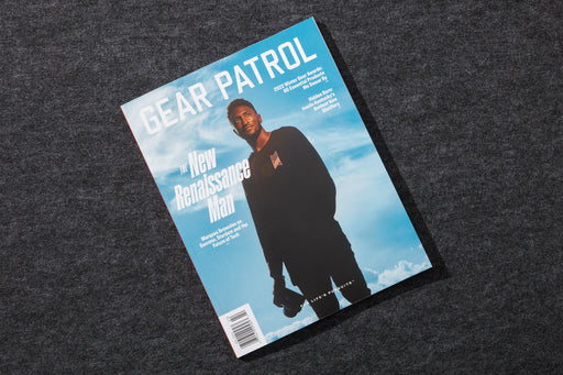gear patrol magazine, issue nineteen with marques brownlee on the cover holding a camera in his hand as he stands in front of a blue sky